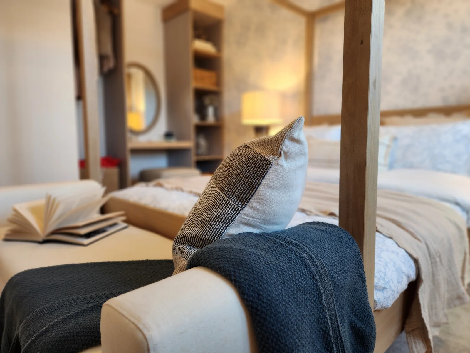 Layered bedding and soft furnishings prepared for a showhome bedroom
